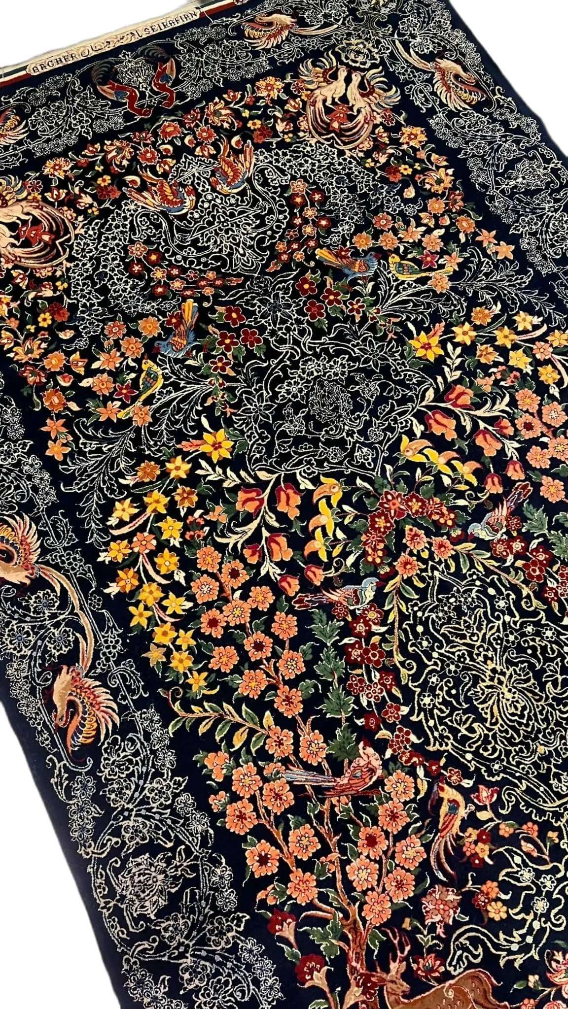 Luxury Isfahan Persian rug by Master Bagher Seirafian with intricate nature motifs.